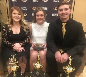 DCHS Basketball Most Valuable Cheerleader Zoe Maynard, Most Valuable Lady Tiger Lydia Brown, and Most Valuable Tiger Tanner Poss were awarded at the annual team banquet
