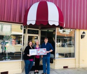 The Smithville-DeKalb County Chamber presented a Community Improvement Award to Anthony and Dana Scott for their beautiful renovations to their downtown Smithville property located at 109 W. Main Street,