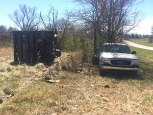 A dump truck and pickup came to rest in a field after a crash Saturday on Highway 56 at the intersection of R. Arnold Road on the DeKalb-Warren County line