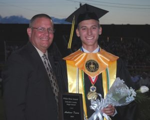 DCHS Principal Randy Jennings Presents White Rose Award to Andrew Fuson