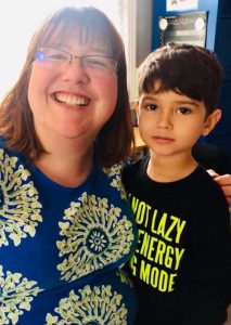 Speech-Language Pathologist Alyssa Conger poses with one of her clients, Levi Chandler.