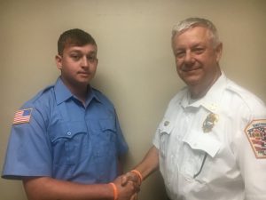 Smithville Fire Chief Charlie Parker congratulates Rookie Firefighter Dillon Hicks on completing LIVE Burn Training at the Tennessee Fire Services & Codes Enforcement Academy