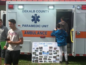 DeKalb Middle School Students take a look inside an ambulance during Tuesday's Career Day