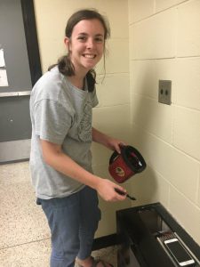Student Carly Vance participating in DCHS Beautification Day