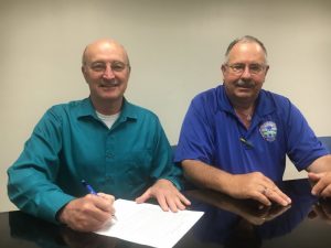 County Mayor Tim Stribling Signs EMS Week Proclamation with EMS Director Hoyte Hale