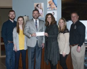 (L to R: Cody Burton, Algebra I math Teacher DCHS, Amy Fricks, Algebra II math teacher DCHS, Chris Townson, CEO DTC Communications, Kathy Bryant, Supervisor of Instruction, 6-12, Jenny Norris, Assistant Principal DCHS, Randy Jennings, Principal DCHS)