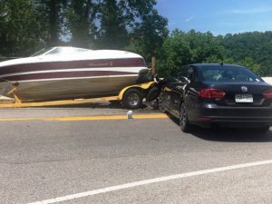Man Charged After Rear End Collision Into Boat Trailer being Towed by Trailblazer