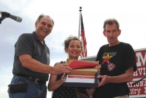 State Senator Mark Pody presented a Tennessee State Flag to Bob and Denise Watke of Spokane, Washington