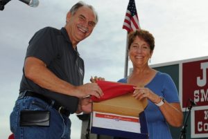 State Senator Mark Pody presented a Tennessee State Flag to Pam Gonzalez of Sacramento, California