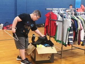 DeKalb Middle School student shops the Saint Bernard Clothing Market Tuesday