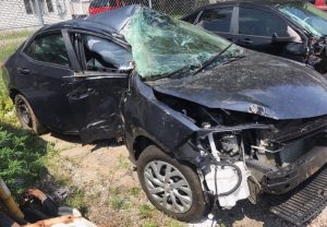 Photo shows Sharon Law’s 2017 Toyota Corolla after being towed and the damage to it from the crash