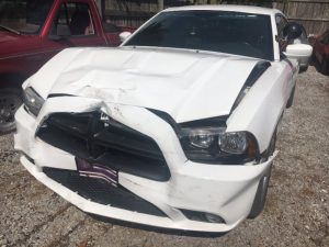 Photo shows damage to Smithville Police Lieutenant Detective Matt Holmes’ patrol car after he rammed Marty Tallent’s vehicle during pursuit