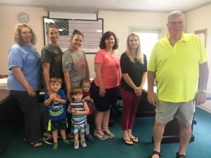 Volunteers met Friday to discuss plans for refurbishing children’s playground in Alexandria: Pictured left to right: Shelly Barnes, Heather Kaceleski, Nolan Martin (wearing blue shark shirt), Kayden Gammons (wearing striped shirt), Andrew Reed (wearing red shirt), Amy Reed, Dr. April Martin, Jessica Cripps, and Alexandria Mayor Bennett Armstrong