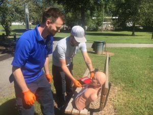 Matt Adcock- AEMT and Trevin Merriman-AEMT treated (mannequin) patient at Green Brook Park during a simulated tornado touchdown disaster drill. This patient was tagged as having an open fracture to the wrist