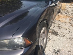 Photo shows damage to Smithville Police Chief Mark Collins patrol car on the driver side after he rammed Marty Tallent’s vehicle trying to force him to stop during pursuit