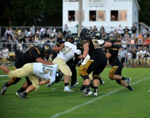 DCHS Tiger Defense stands tall in 33-0 win over Stone Memorial Panthers Friday night in Smithville (Tena Edwards Photo)