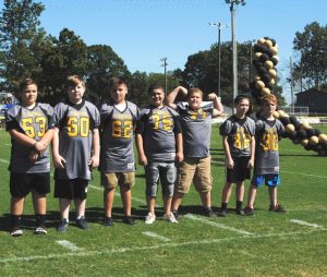 Junior Pro Football Senior Tigers recognized during Homecoming Saturday Part 2: left to right Cole McMillen, Blaine Atnip, Aidan Turner, Victor Locklear, Eli Jones, Rylan Cooper, and Jessie Foutch. Coaches- Lucas Bain, Chris Jones, Chris Mcmillen, and Evan Jones