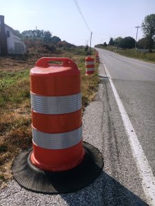 Orange and white road construction barrels line portions of Highway 56 from the southern portion of DeKalb County to near the Green Hill area of Warren County