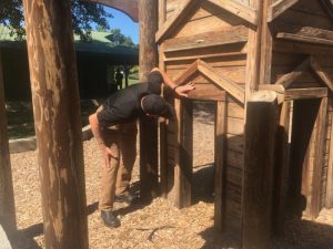 Smithville Police Chief Mark Collins searching for storm victims in playground at Green Brook Park