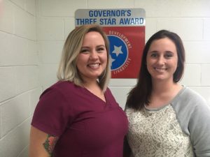 Megan Moore, Director of the DeKalb Animal Coalition Shelter (right) welcomes new employee Emmaly Bennett hired by the Smithville Aldermen Monday night to replace another employee who recently resigned