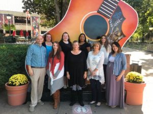 Seven area residents were recently recognized as CNA’s of the Year at NHC Smithville. (L to R: NHC Administrator Clint Hall, CNAs Amanda Buckley, Destiny Bass, Cassie Dyer, Sandra Farless, Maria Amaya, Opal Parker, Stacie McDonald, and Director of Nursing Molly Merriman)