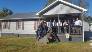 Jamie Nokes Greco and her family celebrated the completion of their home on Sunday afternoon, built in partnership with Habitat for Humanity of DeKalb County. The home is located at 202 Hayes Street in Smithville.