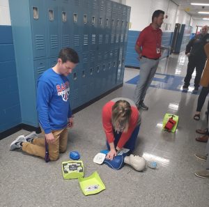 DeKalb Middle School staff implementing an AED drill