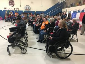 Local Veterans listen as Smithville Elementary Students Sing for them during Friday's Veterans Appreciation Assembly Program