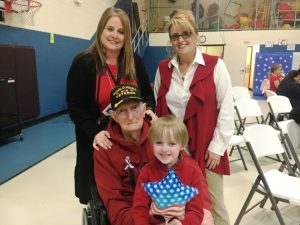 World War II Veteran Edsel Frazier with his granddaughters Melanie Crews and Amanda Dakas and great grandson Jack Crews