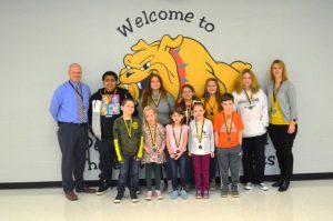 DeKalb West School Students of the Month: Pictured front row left to right: Christian Cripps. Maggie Hendrix, Jordyn Cantrell, Harmony Edwards, and Maddux Pyburn. Pictured back row left to right: Assistant Principal Joey Agee, Jadyn Howard, Teagan Wyatt, Kawasi Troyer, Izzy Prichard, Serenity Patterson, and Principal Sabrina Farler.