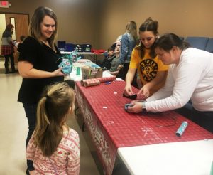 DeKalb West School Junior Beta Club students, teachers, girl scouts and other volunteers participated in 5th annual Regifting Event