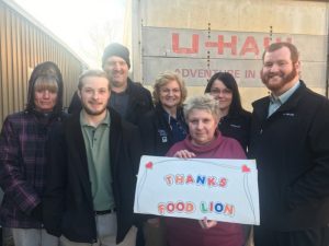 Smithville Food Lion Manager and employees delivered “Food Lion Holidays without Hunger” food boxes to God’s Food Pantry in Smithville. Pictured left to right: Vicki Heisler, Christian Owen, Greg Eller, Delois Bratcher, Erin Polk, Mitchell Herrin with God’s Food Pantry volunteer Pat Zornow (holding sign)