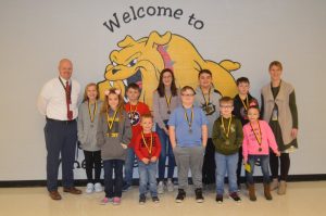 DeKalb West School Announces January Students of the Month: Pictured front row left to right: Zoey Skeen, Gavin Tyree, Logan Winfree, Holden Leiser, and Shaniya Bates. Back row left to right: Assistant Principal Joey Agee, Caroline Crook, Bryce Harvey, Angelina Davenport, Chase Young, Will Bouldon, and Principal Sabrina Farler