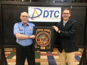 Ed Massey (right) presents the DeKalb Telephone Cooperative (DTC) Rookie of the Year Award of the DeKalb County Volunteer Fire Department to Tony Moore of the Cookeville Highway Station during Saturday night’s annual awards dinner