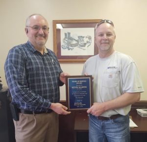 Smithville Electric Service line foreman Kevin Martin (right) was recently presented a plaque by SES manager Richie Knowles on behalf of the board. Martin received a “Years of Service Award” in appreciation for 30 years of hard work, dedication, and commitment to Smithville Electric System and the community. Martin has worked for the company since 1989.