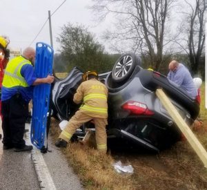 76 year old Sanford Chrisman escaped serious injury in a rollover crash Thursday on Highway 56 in the Shiney Rock Community. (Jim Beshearse Photo)
