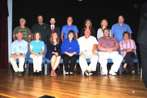 The county commission as it was in September, 2018. Seated left to right: Dr. Scott Little, Beth Pafford, Jenny Trapp, Janice Fish Stewart, Dennis Slager, Myron Rhody, and Julie Young. Standing left to right: Jerry Adcock, Jeff Barnes, Matt Adcock, Bobby Johnson, Anita Puckett, Sabrina Farler, and Bruce Malone