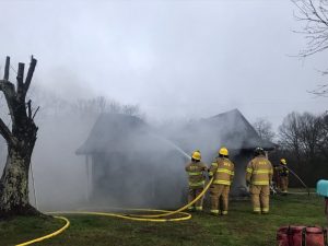 A couple jumped out the window of their home early Thursday morning after waking to find it on fire. Craig Asberry and his wife escaped unharmed but their home at 158 Prater Road, which belonged to Delane Taylor, was gutted in the blaze.