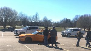 DCHS Tigerette softball fans helped raise funds for the program Saturday at the high school by test driving a new Ford vehicle from Florence & White Ford.