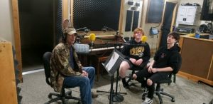 The band “Rosewood” will be featured on WJLE’s “Jammin’ at the 428” today (Friday). The program will air at 8:30 a.m. following the “Old Time Country Community Radio Show”. Jim Hicks, the host of the show (left) will interview band members and DeKalb County High School students Kayson Johnson (right) and Caleb Wood (center). He will also play some of their music.
