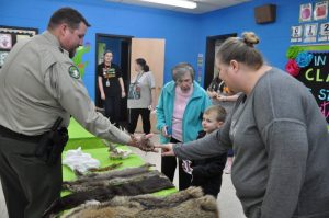 Smithville Elementary School held its first family engagement night on Thursday, February 27th. The theme for the night was WILDCATS: Wild About Learning. Edgar Evins State Park set up for students to explore animal coverings and real live snakes!