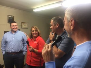 WJLE Project Graduation Radiothon Host Chris Vance (right) interviews Scott Goodwin (far left), Cindy Washer, and Casey Midgett of First Bank who make a $2,000 donation