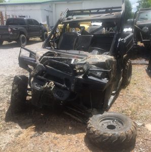 Another view of 2015 side x side Polaris Ranger after being towed to impound lot by Gill Automotive