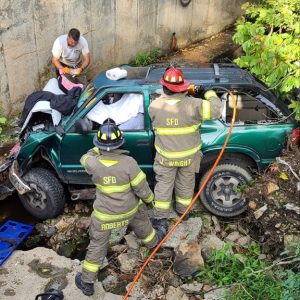 Members of the Smithville Volunteer Fire Department and extrication and rescue team helped Rickey Hall from the vehicle. He was taken by ambulance to Erlanger Hospital in Chattanooga. (Jim Beshearse Photo)