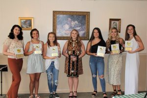 DCHS Basketball Cheerleader Award Winners (left to right) Megan Price, Kortnee Skeen, Makayla Cook, Grace King, Holly Evans, Evie Day, Katie Patterson