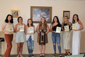 DCHS Basketball Cheerleader Award Winners (left to right) Megan Price, Kortnee Skeen, Makayla Cook, Grace King, Holly Evans, Evie Day, Katie Patterson