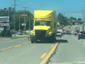 2018 International tractor trailer rig driven by 38 year old Bryan White involved in Monday crash with Nissan Altima at the East Broad Street and South Congress Boulevard traffic light