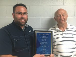 Smithville Alderman Donnie Crook (right) attended his last meeting as a member of the city council Thursday night. During a special meeting, Mayor Josh Miller presented Crook a plaque in appreciation for his service to the city as Alderman for the last two years.