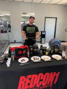 Josh Odom of REDCON1 served up some samples during the Grand Opening of Gym Bob's Fitness Center on Saturday