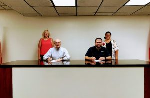 County Mayor Tim Stribling and Smithville Mayor Josh Miller recently signed a proclamation designating September as Suicide Prevention Month in DeKalb County and Smithville. Jennifer Matthews, Director of the DeKalb Prevention Coalition (right-behind mayor Miller) and Kristi Paling, Regional Coordinator at the Tennessee Commission on Children and Youth (left-behind Mayor Stribling) joined Mayors Stribling and Miller for the signing.